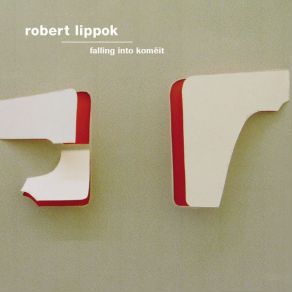 Falling Into Komëit album cover