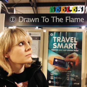 Drawn To The Flame album cover